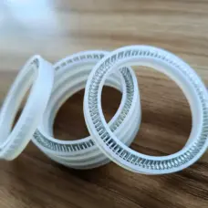 Wear-Resistant Low-Temperature UHMW UPE Spring Energized Seal for Filling Machine Dispenser Liquid Nitrogen Natural Gas Equipment by IKSONIC CO., LTD. China factory manufacturer supplier