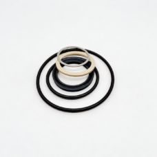 Concentric black sealing rings with two pale rings above them.