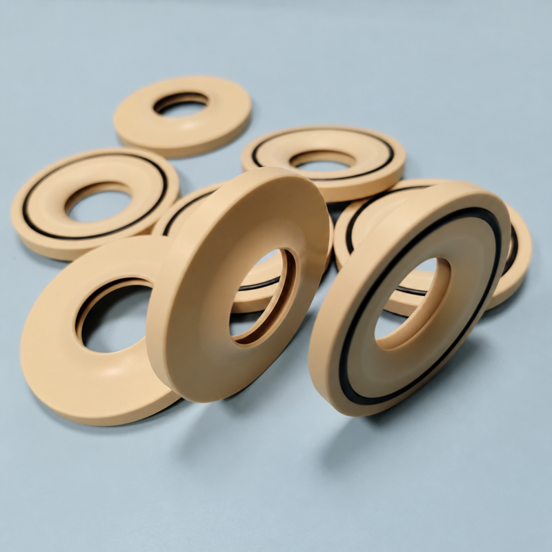 Food-grade double-lip rotary evaporator seals Beige annular seals with dark concentric sealing rings.