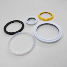 Laser protective lens seal assortment with white, translucent, black and yellow rings in varied profiles.