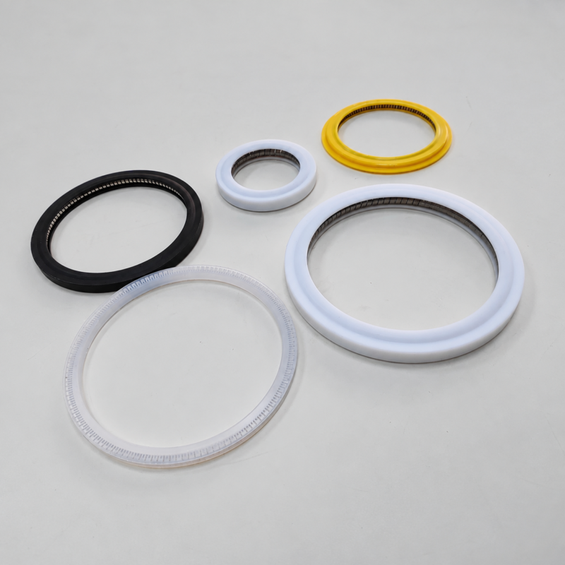 Laser protective lens seals and gaskets Laser protective lens seal assortment with white, translucent, black and yellow rings in varied profiles.