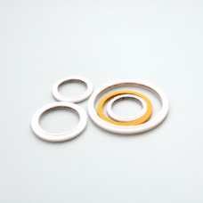 White and yellow annular seals with visible internal metal springs.