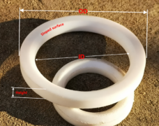 Two overlapping white PTFE ball valve seat rings with English labels for OD, ID, Height and Sloped surface; no numeric dimensions are shown.