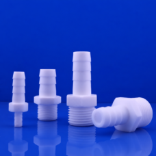 IKSONIC PTFE hose barb fittings for wholesale, with three upright male-threaded fittings and one horizontal fitting.