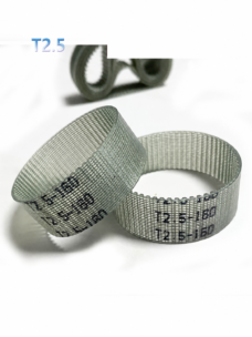 IKSONIC T2.5 polyurethane timing belts in an angled view, showing inner teeth, reinforcement grid and model markings.