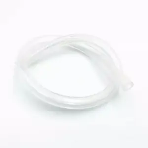 IKSONIC clear silicone tubing loosely coiled on a white background with an open end at the right.