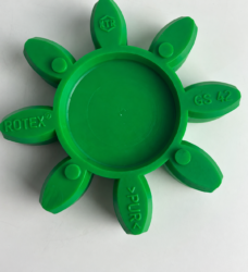 Supplier photo for IKSONIC: cropped detail of a green GS42 eight-arm coupling spider with original KTR, ROTEX and PUR markings; the upper tip and far-left edge are outside the frame.