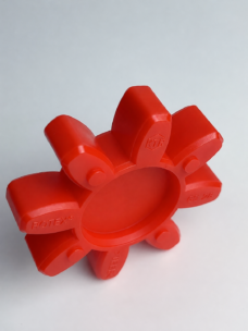 Supplier photo for IKSONIC: complete red eight-arm coupling spider in an angled view, with original molded KTR and ROTEX markings.