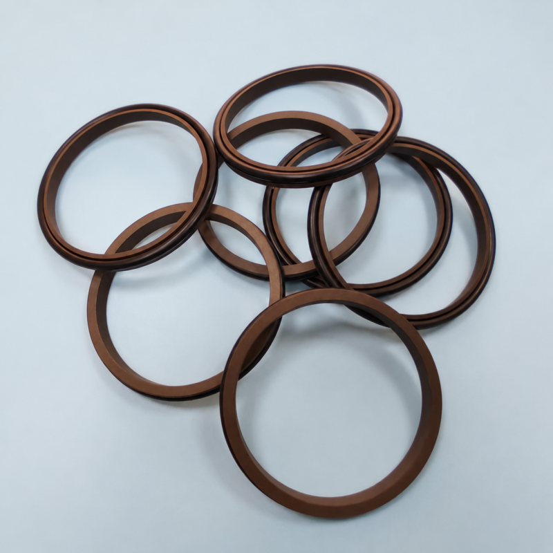 Six overlapping brown sealing rings showing flat and grooved profiles.