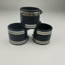 Three black straight pipe connectors with metal hose clamps arranged in a pyramid.