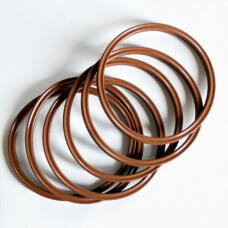 Several brown sealing rings overlapping to show their circular grooved profiles.