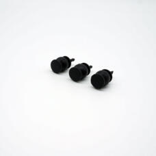 Three black gimbal damping balls resting on their sides, showing flat mounting bases