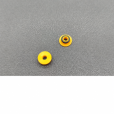 Supplier photograph of two yellow chromatography pump seals in opposite orientations, one with a black ring.