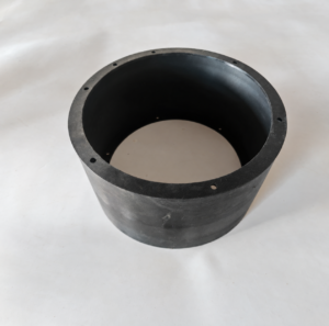 Black IKSONIC cylindrical inflatable rubber seal with a flanged rim and visible mounting holes on a light background.