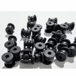 IKSONIC black gimbal vibration dampers arranged to show central holes, retaining flanges and side profiles.