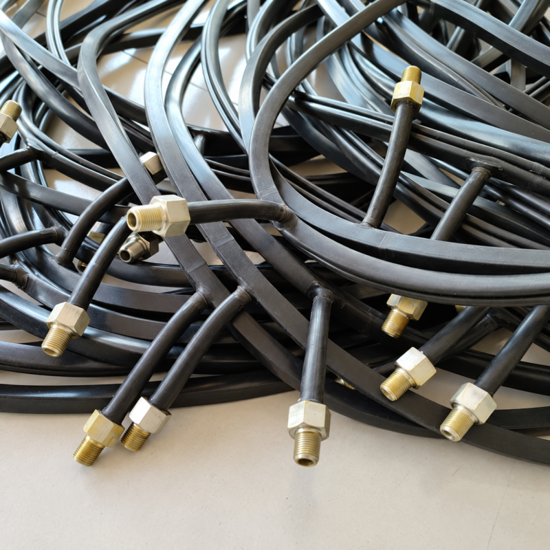 Black inflatable seals with threaded metal fittings from IKSONIC, a China supplier.