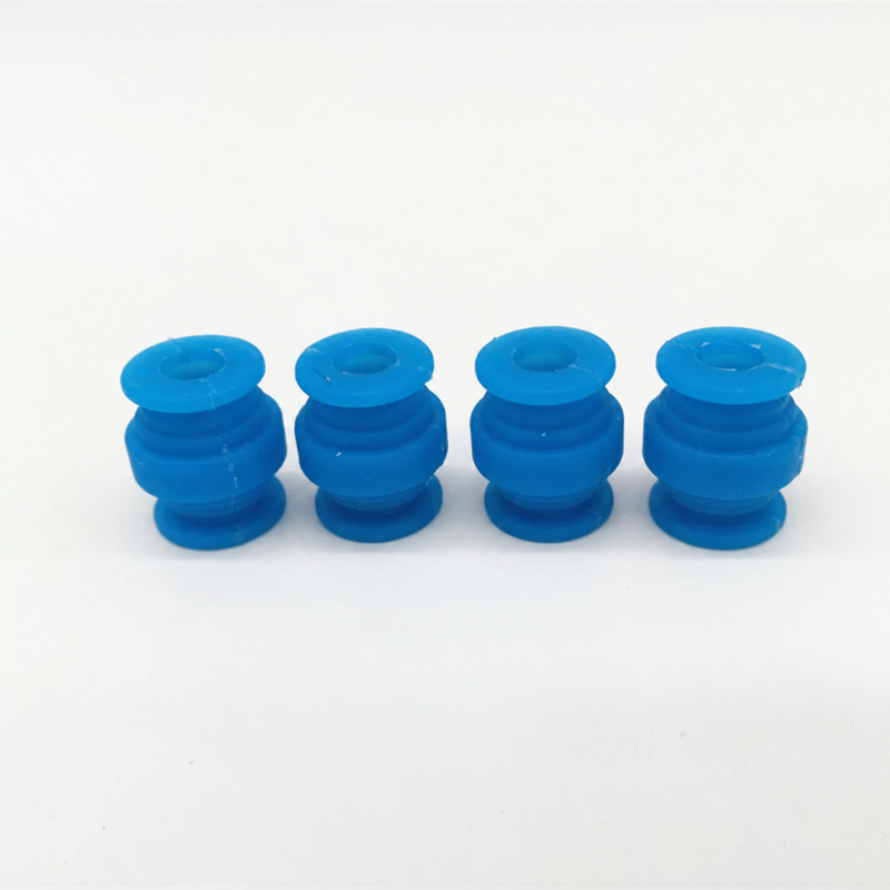 Four blue silicone gimbal damping balls shown for IKSONIC inquiries, with central holes, ribs and flanges.