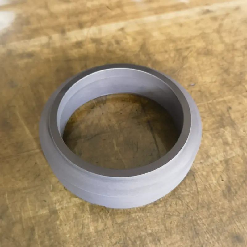 Face view of a C8B-series graphite rotating seal ring.