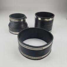 Three clamped rubber pipe connectors showing their open bores and wall profiles; supplied by IKSONIC in China.