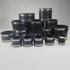 Assortment of black rubber pipe connectors with stainless-steel hose clamps; supplied by IKSONIC in China.