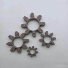 Four purple-grey star coupling inserts of different sizes on a pale background; supplied by IKSONIC, China.