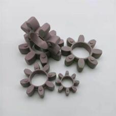 Purple-grey star coupling inserts in several sizes, including an upright insert showing its thickness; supplied by IKSONIC, China.
