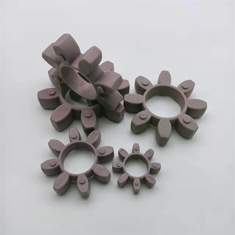 Purple-grey star coupling inserts in several sizes, including an upright insert showing its thickness; supplied by IKSONIC, China.