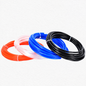 Coils of orange, clear, blue and black IKSONIC polyurethane pneumatic tubing.