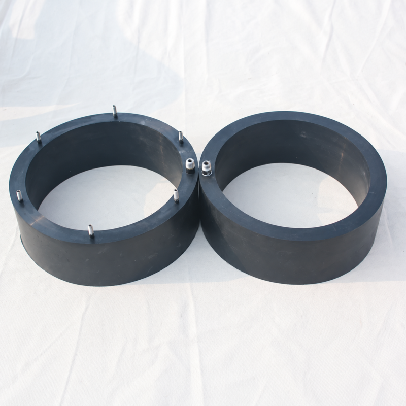 Two IKSONIC custom inflatable seal rings showing mounting studs and air connections.