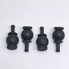 Four black DJI-compatible gimbal dampers in alternating orientations, available from IKSONIC as an aftermarket parts supplier.