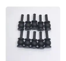 Alternate view of ten black DJI-compatible gimbal dampers in two rows, with the long mounting stems facing upward.