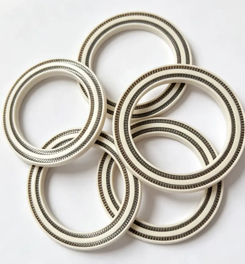 Overlapping PEEK seals showing dual spring channels and sidewall thickness, IKSONIC wholesale product view.
