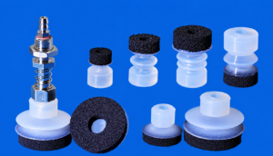 IKSONIC product composite of foam suction cups, a loose pad and a spring-loaded fitting.