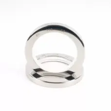 Stainless steel oil seals with light-colored PTFE sealing elements, supplied by IKSONIC in China
