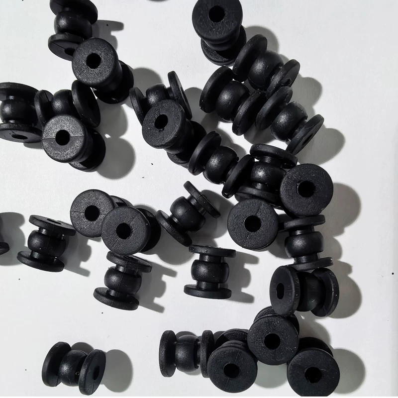 Top view showing central holes and flanges on black gimbal dampers, IKSONIC wholesale supply.