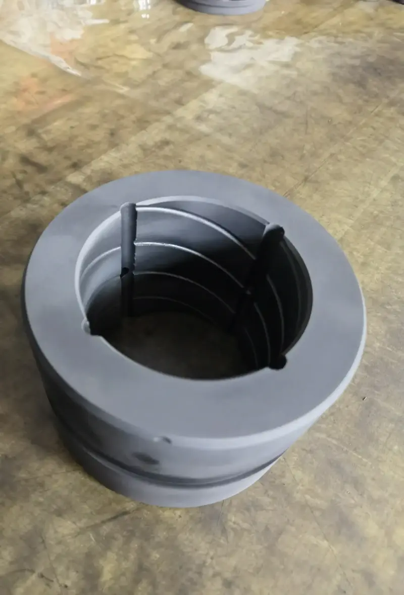IKSONIC graphite bushing with visible grooves inside the bore.
