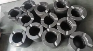 Assortment of IKSONIC graphite bushings showing different sleeve profiles.
