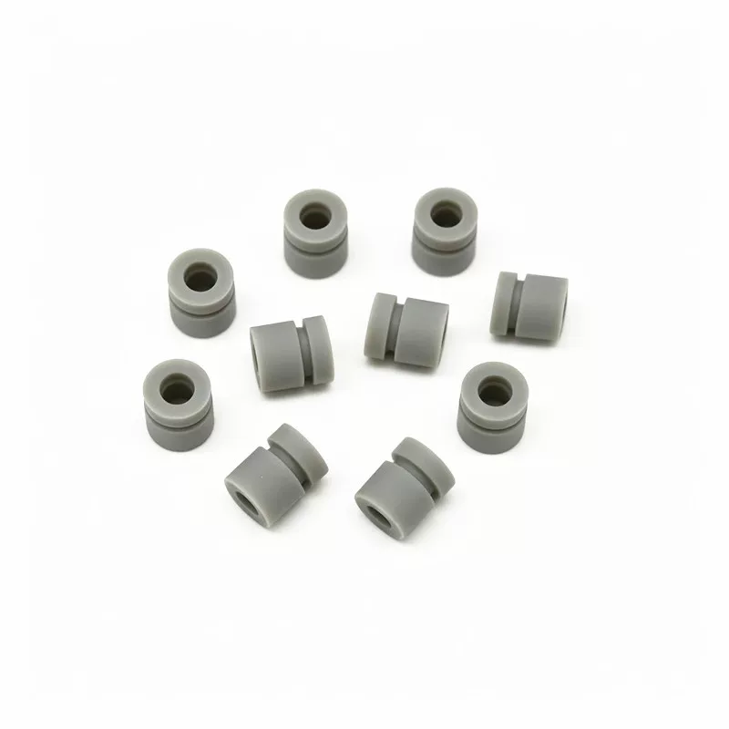 Grey grooved damping parts in different orientations, shown for IKSONIC wholesale inquiries.