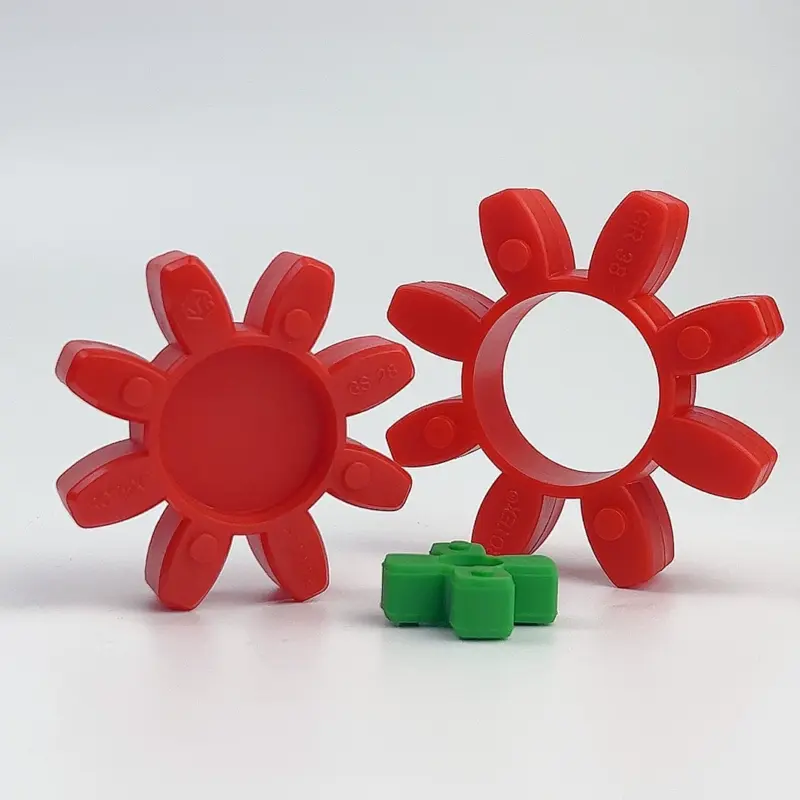 iksonic-gs-coupling-inserts-red-green-china-supplier Red eight-arm and green four-arm GS coupling inserts in a supplier assortment offered by IKSONIC China.
