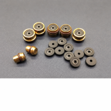 IKSONIC supplier photo of five assembled hot-melt seal housings, ten loose seal disks and two side-view housings.