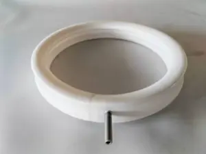 White IKSONIC inflatable seal ring with a threaded metal air connection.
