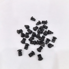 Black gimbal damping pieces for Mini 5 Pro in a scattered grouping, showing their flanges and mounting openings.