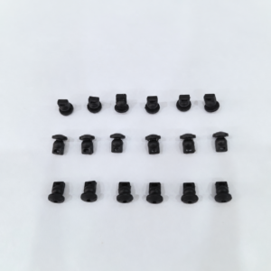 Eighteen black IKSONIC gimbal damping pieces for Mini 5 Pro arranged in three rows of six from different viewing angles.