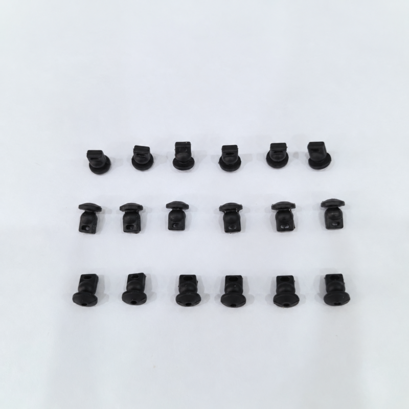 Eighteen black gimbal damping pieces for Mini 5 Pro arranged in three rows of six from different viewing angles.