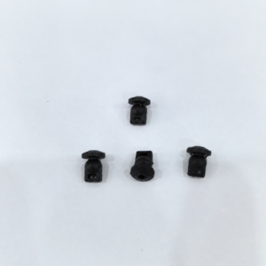 Four black IKSONIC gimbal damping pieces for Mini 5 Pro arranged to show their flanges and mounting openings.