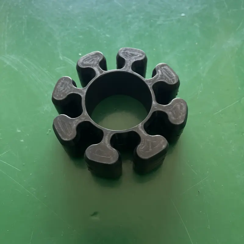 Face detail of a black grinder coupling insert and central opening, IKSONIC wholesale enquiry