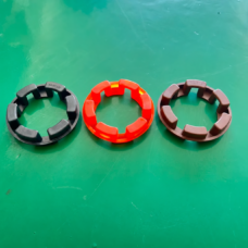 Black, orange and brown NM flexible coupling rings available for wholesale inquiries from IKSONIC.