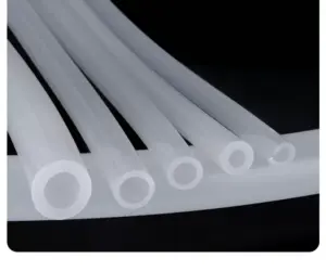 Five angled IKSONIC silicone tube ends showing different bores and wall sections.