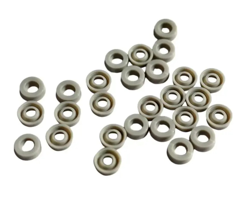 Gray polyurethane cylinder seals showing lip profiles and reverse faces, available wholesale from IKSONIC.