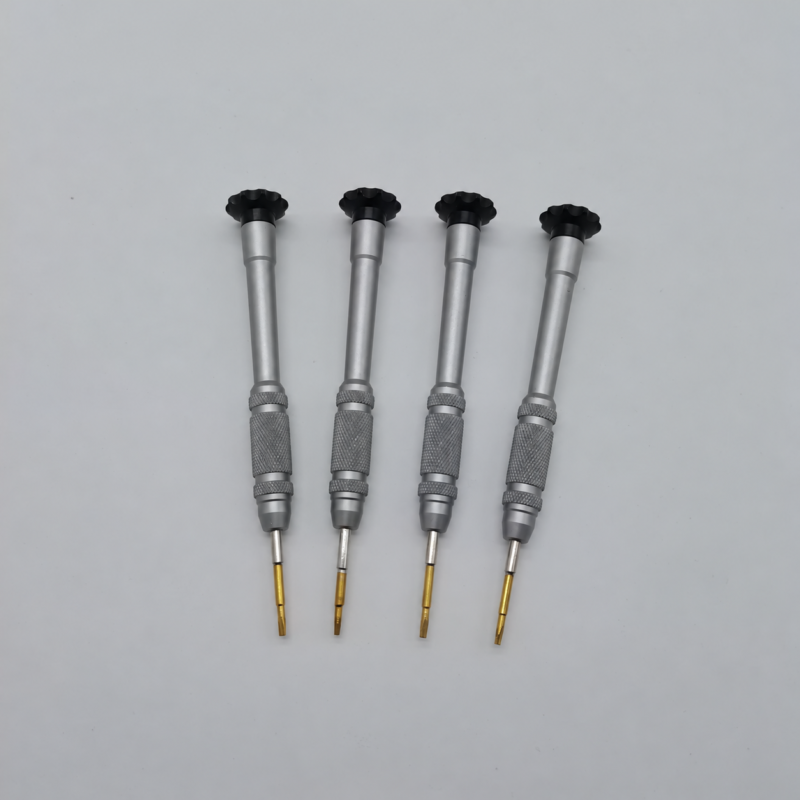 iksonic-precision-screwdriver-supplier-four-driver-view Four IKSONIC T6 precision screwdrivers with silver-colored knurled handles and black swivel caps on a gray background.